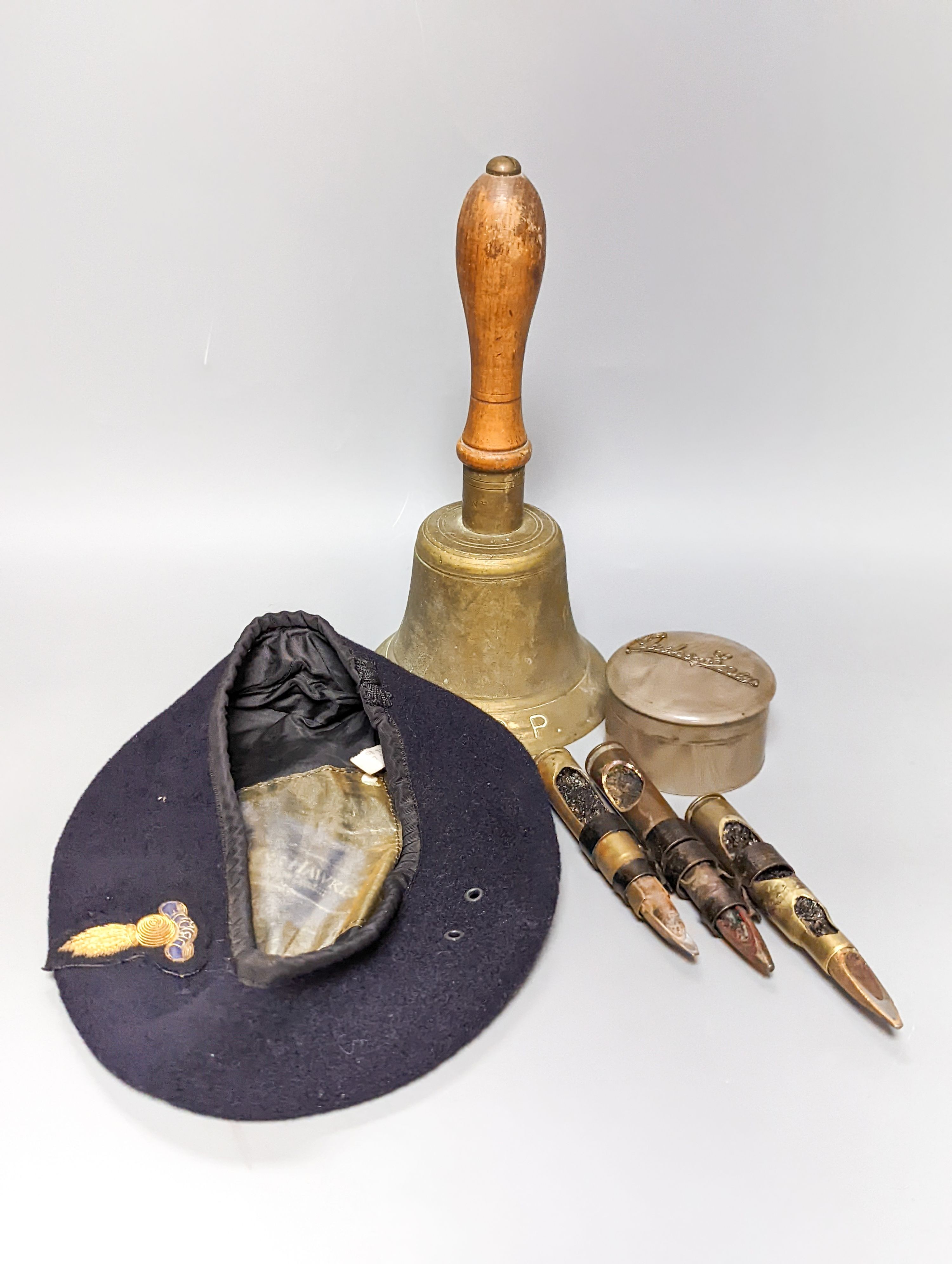 Three rare incendiary cartridge cut always, a beret with rare Royal Engineers officer's bullion wire '9-flame' cap badge, ARP bell dated '39 and various Boys Brigade cap badges